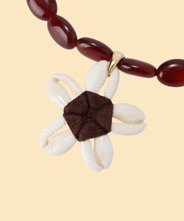 flower shell necklace – NKNIT
